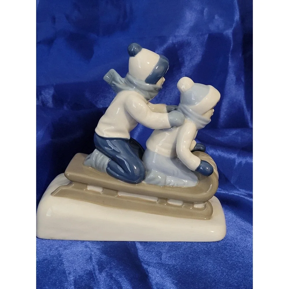 Porcelain Figurine Paul Sebastian Porcelana  Cuernavaca Children on Sled Vintage